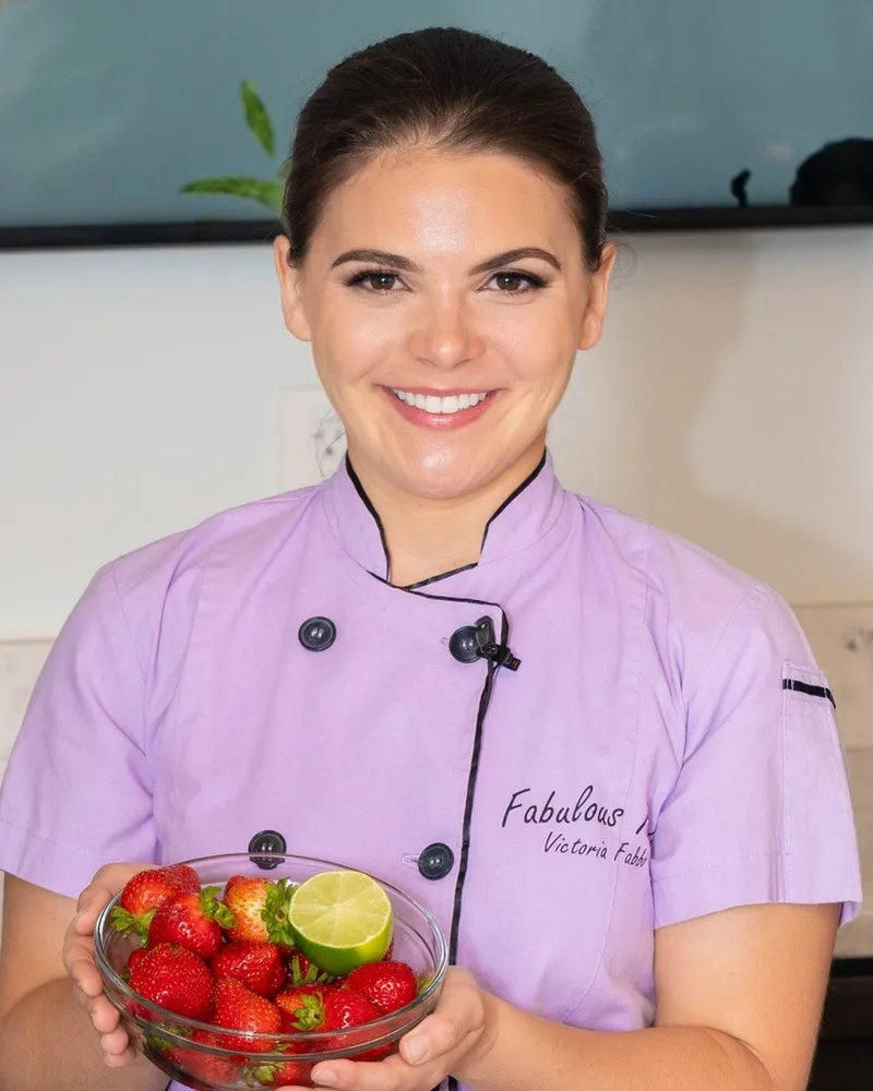 Victoria Fabbo, MPH, RDN, LDN, Consulting Dietitian at Prata Health, holding a bowl of fresh fruit